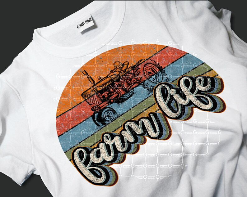May include: A white t-shirt with a vintage-style graphic of a red tractor in front of a sunset with the text "farm life" in a retro font.