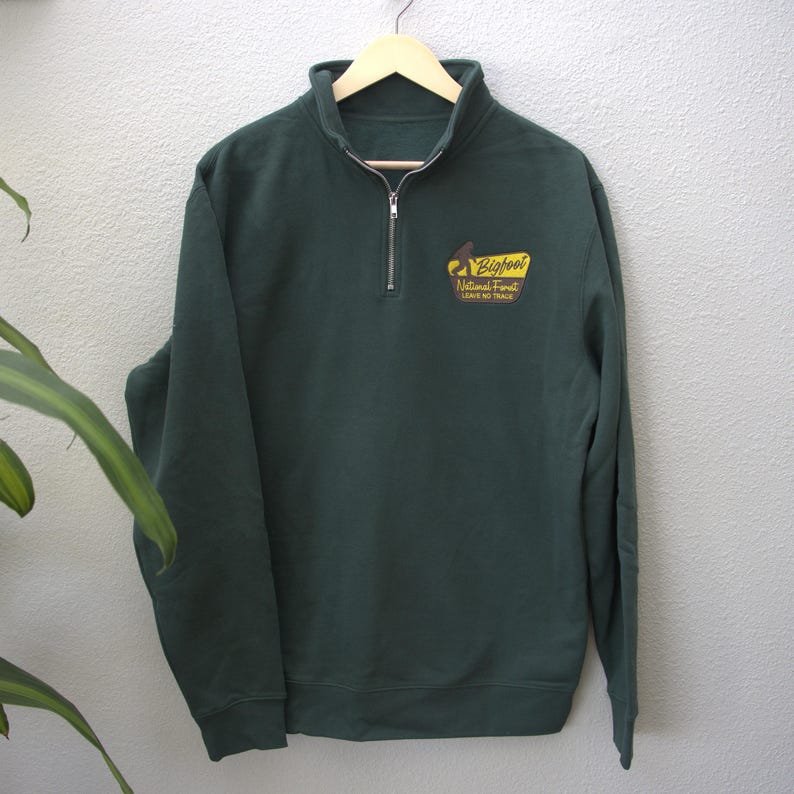 Bigfoot National Forest embroidery on an adult quarter zip
