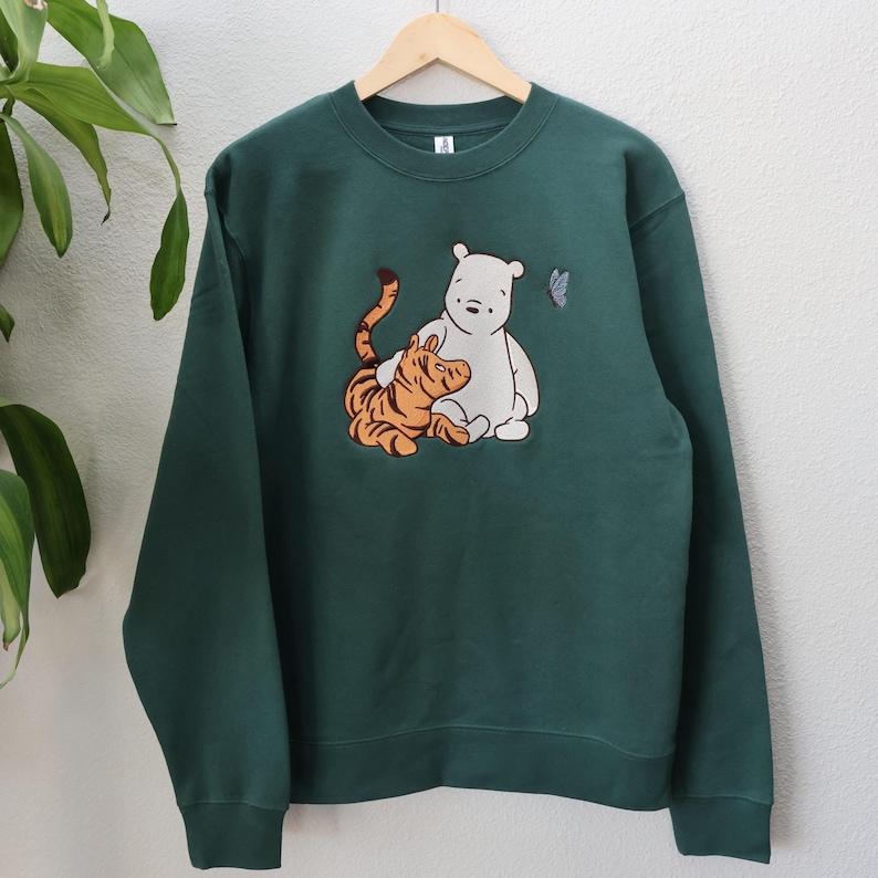 Pooh Hug Embroidered Crewneck & Hoodie in Alpine Green