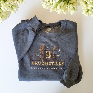 Three broomsticks sweatshirt best sale