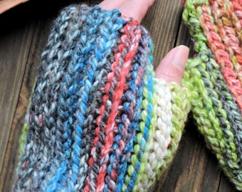 May include: A pair of colorful fingerless gloves with a striped pattern. The gloves are made of a soft, textured yarn and are perfect for keeping your hands warm in the winter.