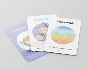 May include: A set of 35 chakra cards with colorful illustrations and text. The cards are designed to help develop balance and wellness. The cards feature a rainbow circle with a starburst design, a woman in a waterfall pose, and a woman in a crown chakra pose.