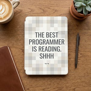 May include: A white ceramic mug with a black handle and the text "But First, Coffee" in a handwritten style. The mug is on a white surface. The mug is approximately 4 inches tall.