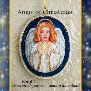 May include: A cross stitch pattern of an angel holding a star, with a blue background and gold trim. The pattern is titled "Angel of Christmas" and is available as a PDF file for instant download.