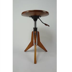 Modern piano stool. Stool for drum set
