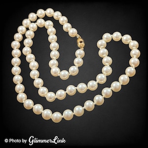 Collier Monet classique blanc crème noué en fausses perles dorées pour mariage