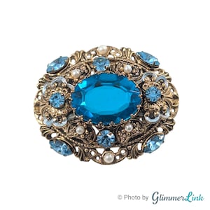 Vintage 1960s Germany Ornate Oval Blue Glass Domed Filigree Gold Tone Brooch Pin