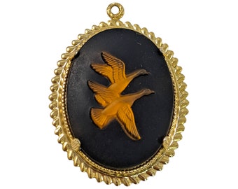 Vintage Flying Fowl Oval Black and Gold Tone Cameo Style Pendant