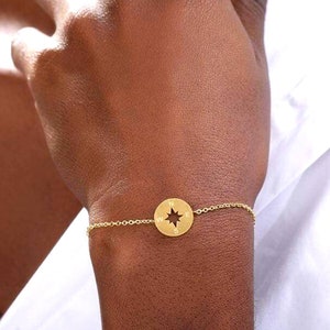 Gold top compass bracelet