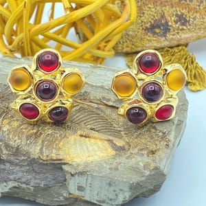 Vintage Monet Clip On Earrings: Gold Tone with Red, Purple, & Gold Cabochons