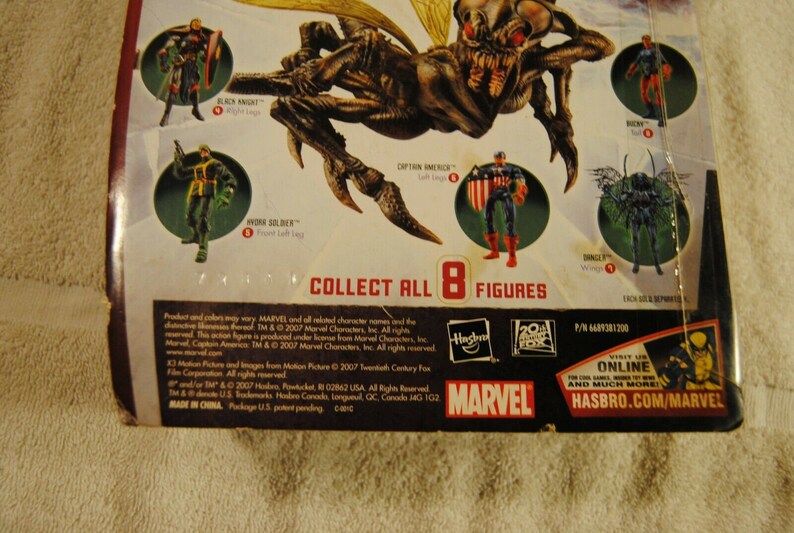 May include: Marvel action figure packaging featuring various characters, including Captain America and Black Knight. The packaging displays the text "COLLECT ALL 8 FIGURES" and the Marvel and Hasbro logos.