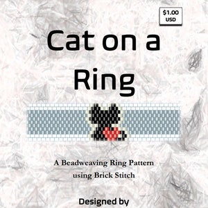 May include: A beadweaving pattern for a ring featuring a black cat with a red heart. The pattern is called "Cat on a Ring" and is designed by Monica Valentinelli. The pattern uses brick stitch.