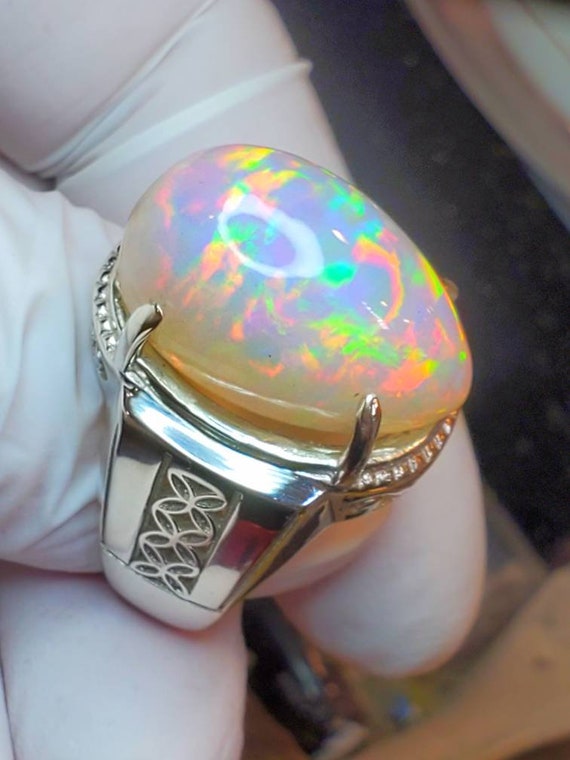 A Rare Natural Cabochon Crystal Opal and Paste Cluster Ring, circa 190 –  Antique Ring Boutique