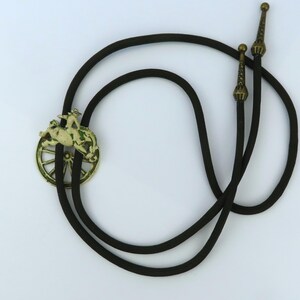 Bronc Rider Bolo Tie, Vintage Bolo with Cowboy, Bucking Bronco, Wagon Wheel, Olive Cord