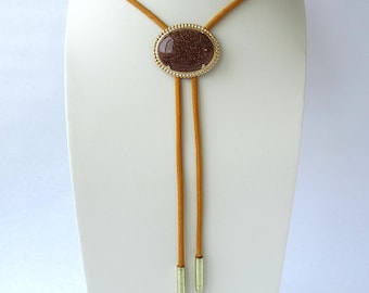 Goldstone Bolo Tie: Goldstone Cabochon Slider, Goldenrod Cord with Bullet Tips