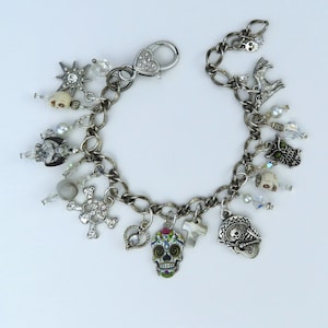 Silver and White Gothic Bracelet: Sugar Skulls, El Guitarro, Crystals, and Charms, Adjustable Size