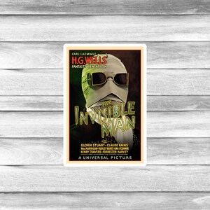 May include: A sticker featuring a vintage movie poster for "The Invisible Man." The poster has a dark background with the title in large, stylized letters. The image includes the film's title, cast, and the text "A Universal Picture."