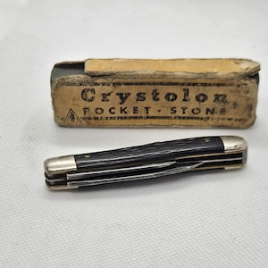 Navaja de bolsillo Kutmaster de dos hojas y afilador antiguo de piedra de bolsillo Crystolon