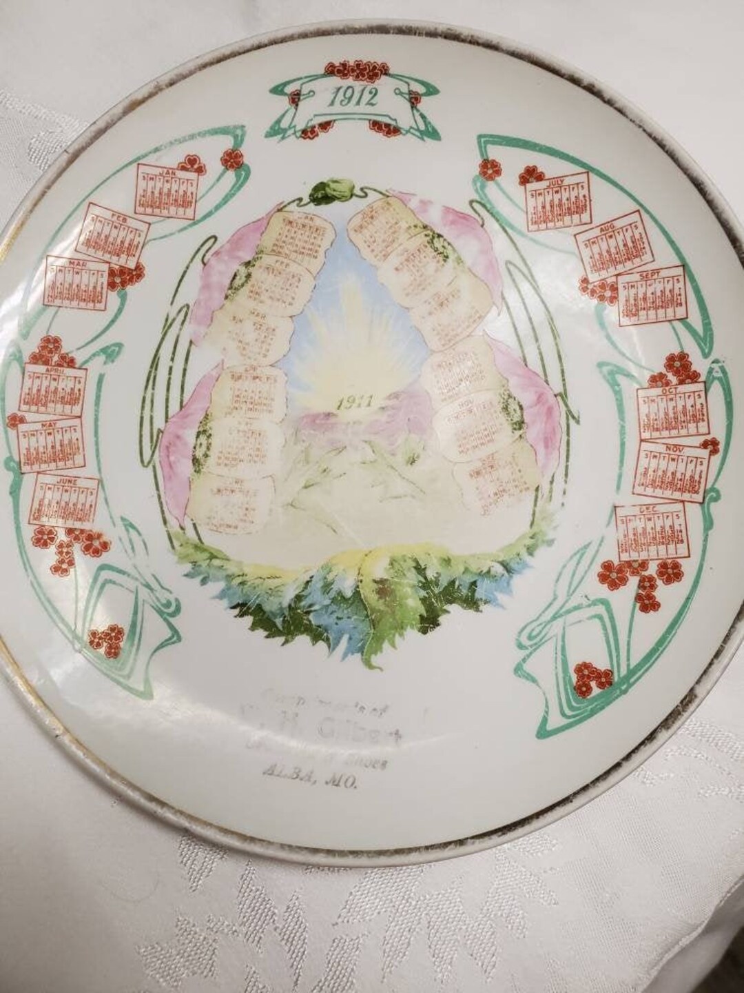 1912年カレンダー付き陶器プレート 1912 年カレンダープレート、ミズーリ州アルバ、W.H. ギルバート、食料