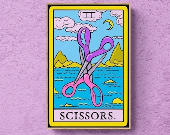May include: A tarot card with a yellow background and a blue sky with clouds. The card depicts a pair of pink scissors with silver blades, crossed over each other. The card is labeled "II SCISSORS."