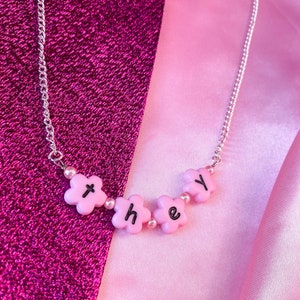 THEY necklace, cute flower shape light pink letter bead necklace, non binary pronoun statement necklace
