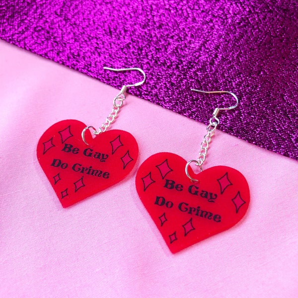 Be Gay Do Crime text on red love heart earrings, lesbian earrings, gay pride earrings | queer pride earrings, anarchist earrings