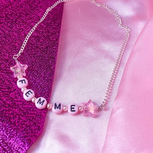 FEMME necklace, cute light pink letter bead necklace with iridescent star charms, sapphic WLW pride statement necklace