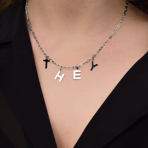 THEY lettering stainless steel necklace, non binary pronoun pride silver colour statement necklace