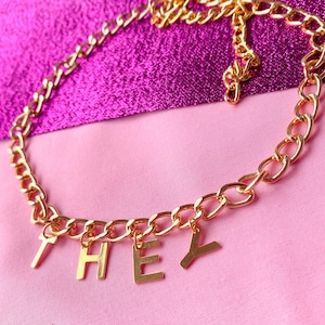 THEY lettering golden colour necklace, non binary pronoun pride statement necklace