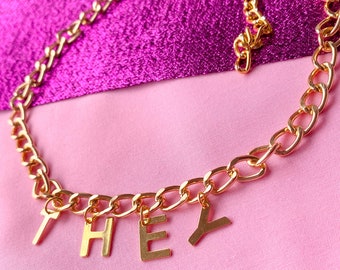 THEY lettering golden colour necklace, non binary pronoun pride statement necklace