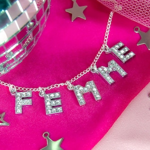 FEMME Diamanté letter charm necklace, Femme Lesbian pride sparkle necklace | Glittery rhinestone word necklace, Sapphic gay pride jewelry