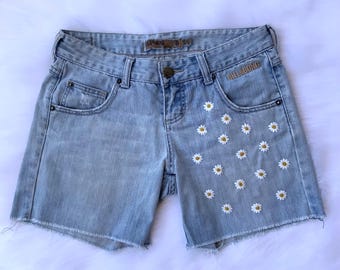Scattered daisies hand embroidered denim shorts