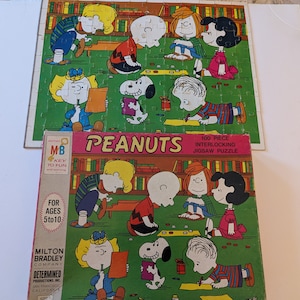 Charlie Brown ,Peanuts puzzle. This is a vintage peanuts puzzle.  Charlie Brown in the gang. Snoopy, Linus.