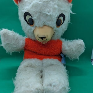 Teddy bear. This is a rubber faced teddy bear,vintage between 1950s and &#39;60s. It has a rubber nose and plastic eyes. Styrofoam like stuffing