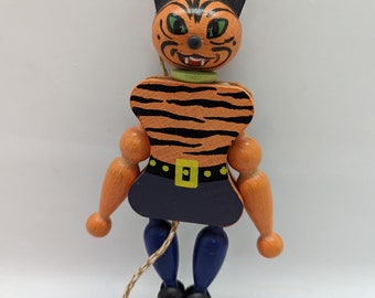 This is a wooden cat Marinette or pull toy, puppet. This black and orange stripe marionette cat would be great for Halloween. Hand painted.