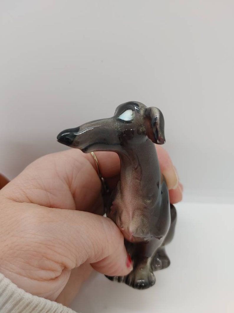 Hand painted and made in Japan.In perfect condition. Salt and pepper shakers Vintage howling dogs