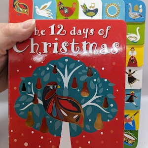 Livro infantil de Natal. Os 12 dias de Natal. Livro colorido e bem ilustrado. As páginas são de papelão mais duro. Em perfeito estado.