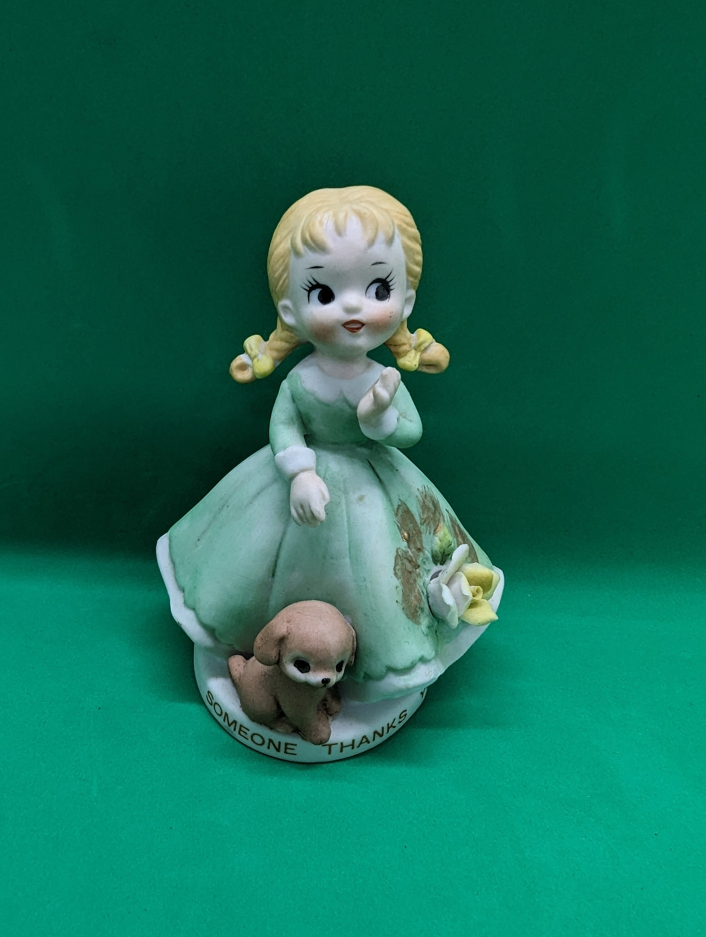 Puppy and girl figurine. This is a vintage figurine. Imported by giftcraft and Toronto. 1940s. Thank you figurine. Somebody thanks you