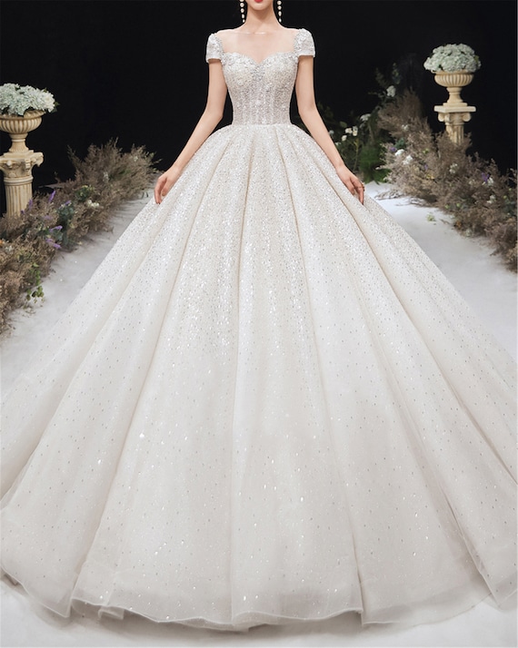 Crystal beaded wedding gowns Inspired by Leo Almodal