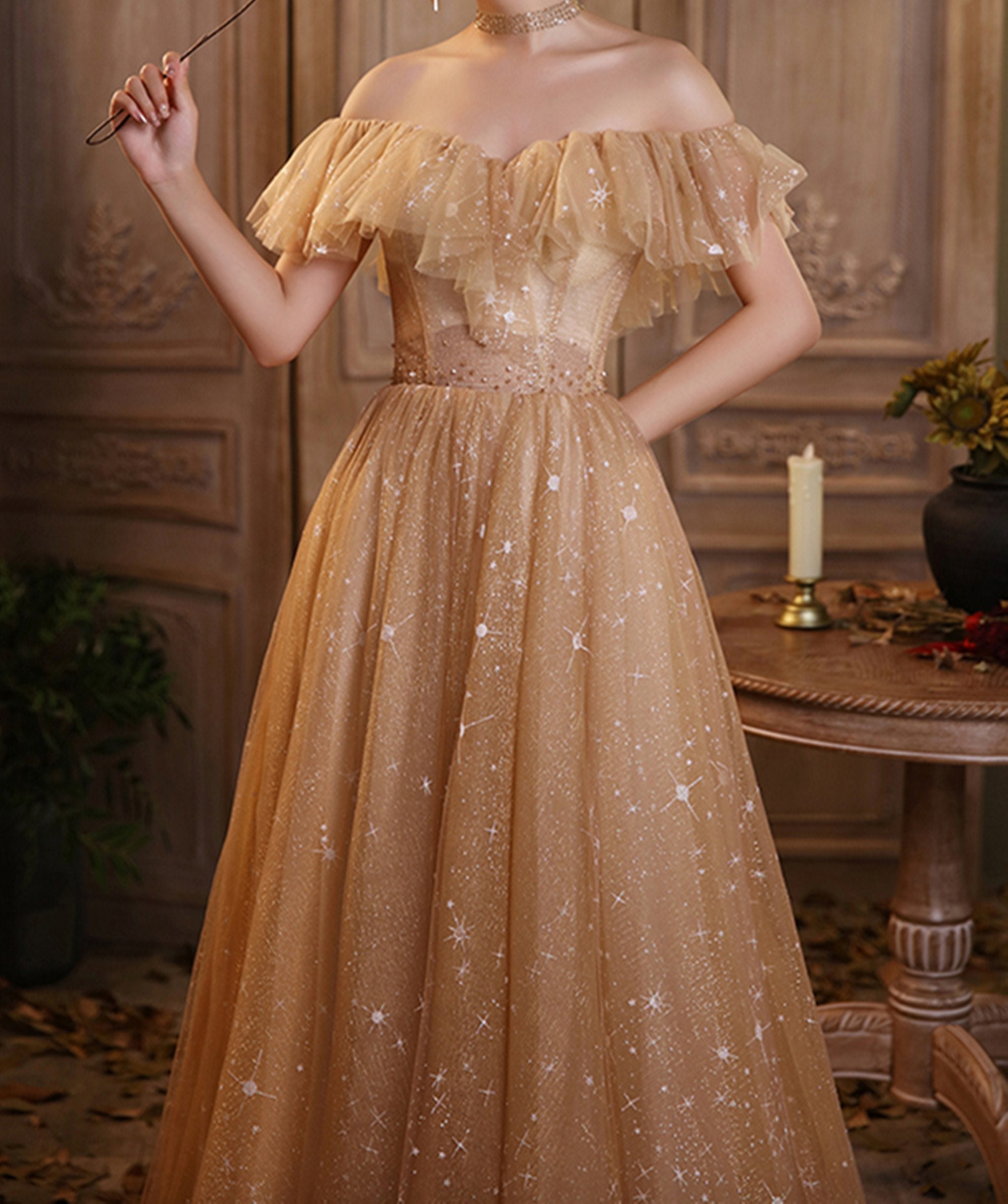 off the shoulder champagne gown