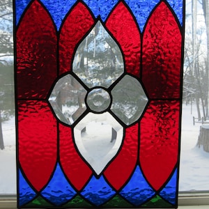 Stained glass red, blue and green bevel cluster panel