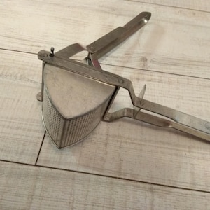 Vintage Potato press, Vintage hand metal press, Old kitchen press
