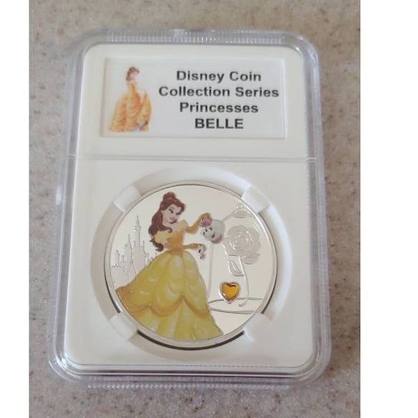 Disney Collective Medallion Coin Jeweled Heart Princesses - Belle & Castle LE150 displayed and protected in a beautiful coin slab