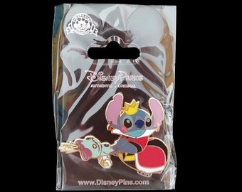 May include: A blue Stitch character wearing a red and gold king's costume with a gold crown. Stitch is holding a playing card in his right hand. The pin is packaged in a clear plastic bag with a Disney Parks logo and the text "www.DisneyPins.com".