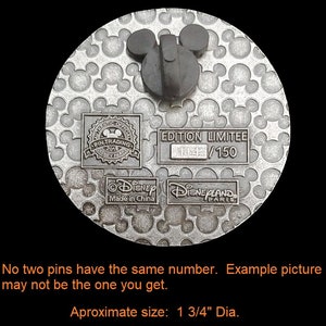 May include: Silver pin with a Mickey Mouse head design. The back of the pin features the text "Authentic Official Pin Trading 2018 Disney Parks", "Edition Limit&eacute;e 14/150", "&copy; Disney Made in China", and "Disneyland Paris".