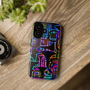May include: A smartphone case featuring a vibrant, neon-colored graphic pattern of various brass musical instruments including French horns and trumpets, set against a dark background with glowing blue, green, red, and purple outlines.