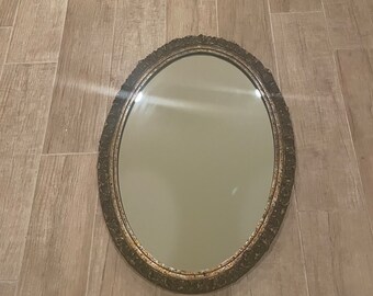 Vintage gold framed oval mirror