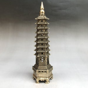 Ancient Chinese bronze statue of hand-carved pagoda
