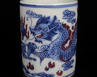 Exquisite Chinese antique brush holder with blue and white underglaze red dragon and cloud design, hand-painted.