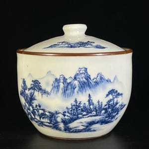 A rare and exquisite Chinese antique hand-painted blue and white landscape covered jar ornament